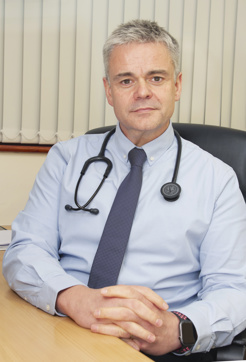 Dr Neil O'Brien sitting